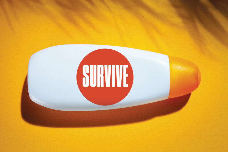 a white bottle of sunscreen with a red stick that says survive